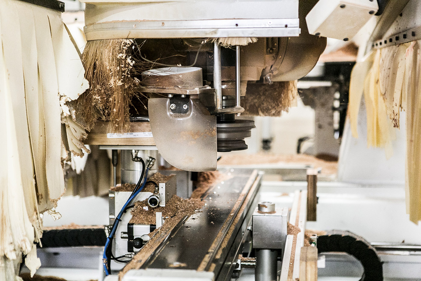 Machine d’usinage de bois, avec un système d’aspiration des poussières de bois